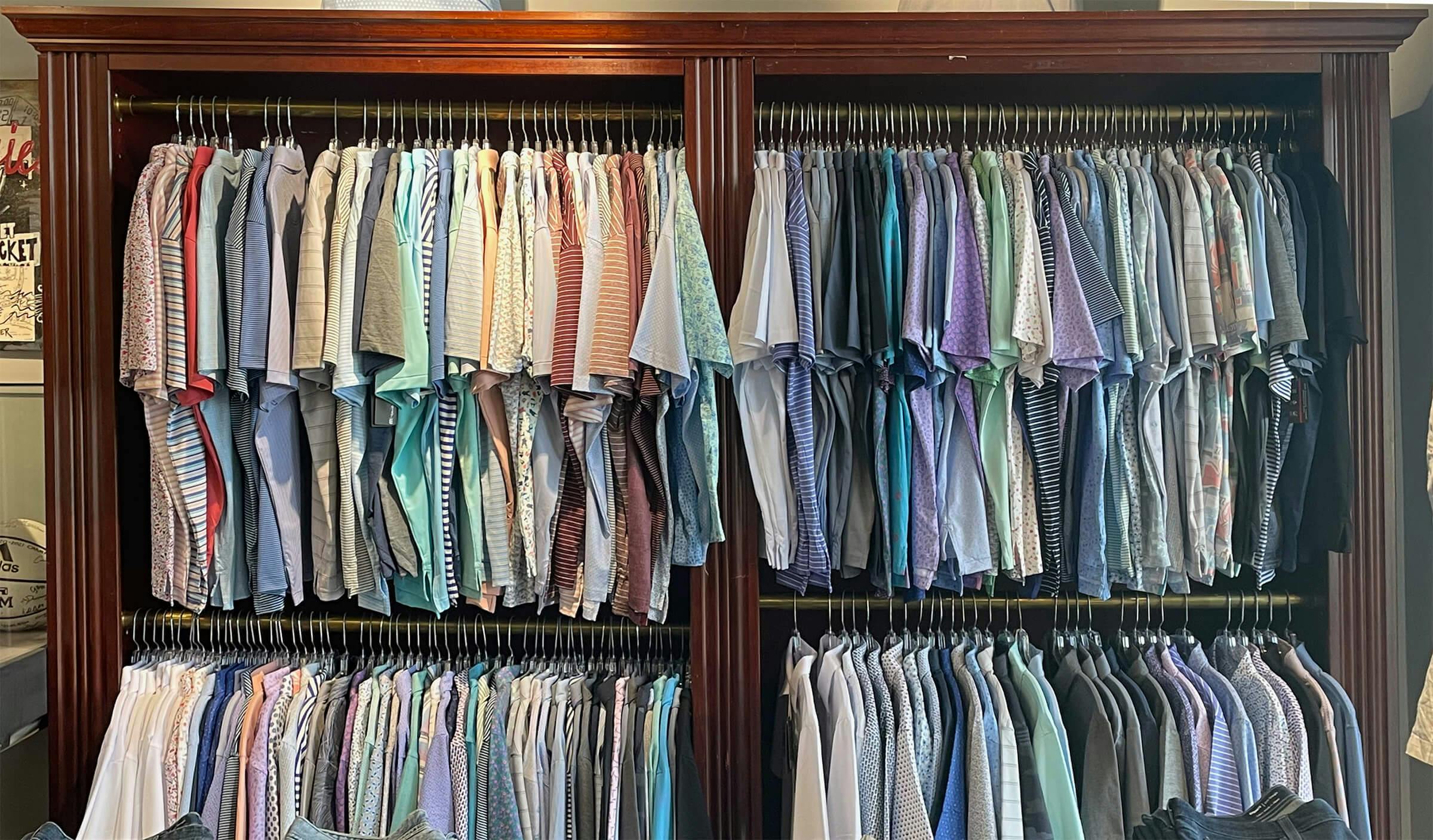 Assorted polo shirts with various patterns and colors.
